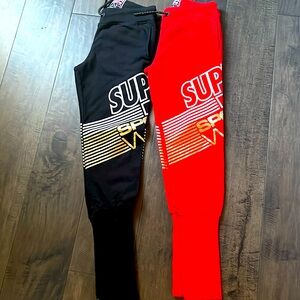 2 Superdry Joggers Red and Black with Gold size U.S. 8